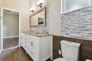 Stunning 4-bedroom, 3-bath pool home with spa on a serene pond on Crescent Oaks Country Club in Florida - for sale on GolfHomes.com, golf home, golf lot