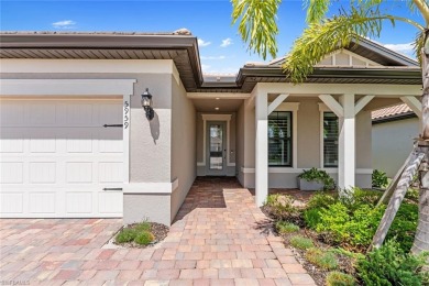 POOL & BREATHTAKING WATER VIEW! Welcome to this better-than-new on Panther Run Golf Club in Florida - for sale on GolfHomes.com, golf home, golf lot