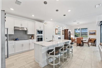 POOL & BREATHTAKING WATER VIEW! Welcome to this better-than-new on Panther Run Golf Club in Florida - for sale on GolfHomes.com, golf home, golf lot