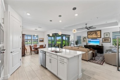 POOL & BREATHTAKING WATER VIEW! Welcome to this better-than-new on Panther Run Golf Club in Florida - for sale on GolfHomes.com, golf home, golf lot