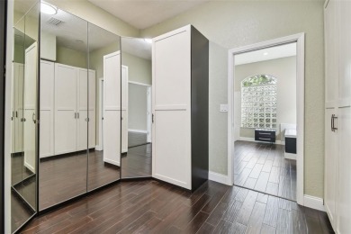 Stunning 4-bedroom, 3-bath pool home with spa on a serene pond on Crescent Oaks Country Club in Florida - for sale on GolfHomes.com, golf home, golf lot
