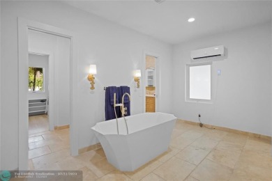 Exceptional turnkey 4 bedrooms/6.5 bathrooms home in Palm Aire on Oaks Country Club in Florida - for sale on GolfHomes.com, golf home, golf lot