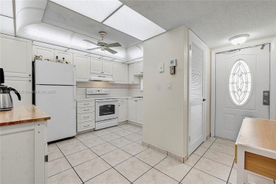 This well maintained 2-bedroom, 2-bath condo, ideally situated on Hollybrook Golf and Tennis Club  in Florida - for sale on GolfHomes.com, golf home, golf lot