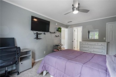 Welcome to this beautifully updated brick-front home offering a on Hamilton Mill Golf Club in Georgia - for sale on GolfHomes.com, golf home, golf lot