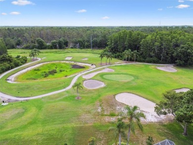 Stunning 4-bedroom, 3-bath pool home with spa on a serene pond on Crescent Oaks Country Club in Florida - for sale on GolfHomes.com, golf home, golf lot