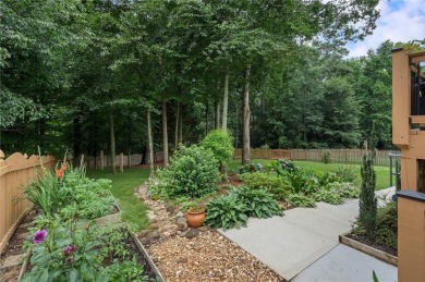 Welcome to this beautifully updated brick-front home offering a on Hamilton Mill Golf Club in Georgia - for sale on GolfHomes.com, golf home, golf lot