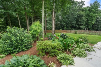 Welcome to this beautifully updated brick-front home offering a on Hamilton Mill Golf Club in Georgia - for sale on GolfHomes.com, golf home, golf lot