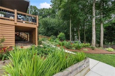 Welcome to this beautifully updated brick-front home offering a on Hamilton Mill Golf Club in Georgia - for sale on GolfHomes.com, golf home, golf lot
