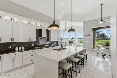 Discover an extraordinary lakefront estate in the Legends at on  in Florida - for sale on GolfHomes.com, golf home, golf lot