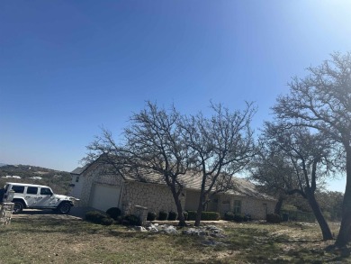 Want a COOL LAKE VIEW? Look at this! The home is so cute, one on Slick Rock Golf Course - Horseshoe Bay in Texas - for sale on GolfHomes.com, golf home, golf lot