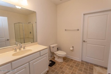 Enjoy easy, low-maintenance living in this beautifully on Crow Creek Golf Club in North Carolina - for sale on GolfHomes.com, golf home, golf lot