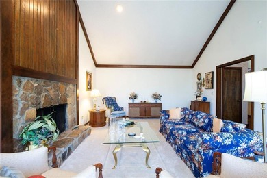 Tucked among mature trees and backing to the Rivermont golf on Rivermont Golf and Country Club in Georgia - for sale on GolfHomes.com, golf home, golf lot