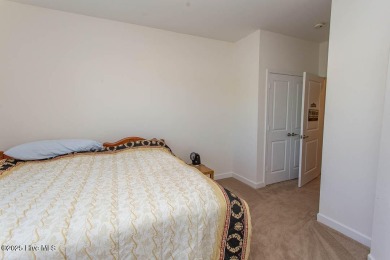Enjoy easy, low-maintenance living in this beautifully on Crow Creek Golf Club in North Carolina - for sale on GolfHomes.com, golf home, golf lot