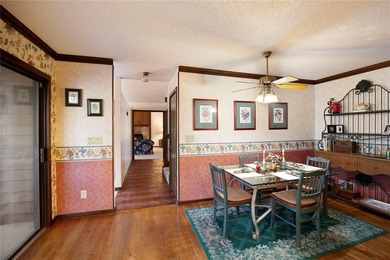 Tucked among mature trees and backing to the Rivermont golf on Rivermont Golf and Country Club in Georgia - for sale on GolfHomes.com, golf home, golf lot