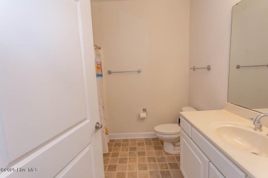 Enjoy easy, low-maintenance living in this beautifully on Crow Creek Golf Club in North Carolina - for sale on GolfHomes.com, golf home, golf lot