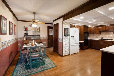 Tucked among mature trees and backing to the Rivermont golf on Rivermont Golf and Country Club in Georgia - for sale on GolfHomes.com, golf home, golf lot