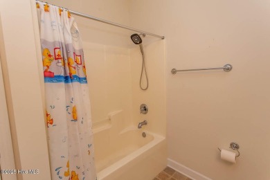 Enjoy easy, low-maintenance living in this beautifully on Crow Creek Golf Club in North Carolina - for sale on GolfHomes.com, golf home, golf lot