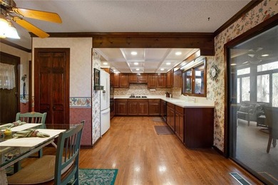 Tucked among mature trees and backing to the Rivermont golf on Rivermont Golf and Country Club in Georgia - for sale on GolfHomes.com, golf home, golf lot