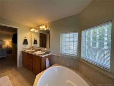 Wow this home has it all!! New A/C, new flooring & fans w/lights on Indianwood Golf and Country Club in Florida - for sale on GolfHomes.com, golf home, golf lot