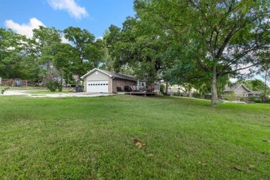 Enjoy a peaceful, park-like setting in this conveniently located on Harrison Country Club in Arkansas - for sale on GolfHomes.com, golf home, golf lot