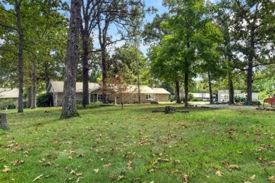 Enjoy a peaceful, park-like setting in this conveniently located on Harrison Country Club in Arkansas - for sale on GolfHomes.com, golf home, golf lot