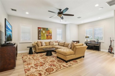 Prepare to live the ultimate Florida lifestyle in this on Hunters Green Country Club in Florida - for sale on GolfHomes.com, golf home, golf lot