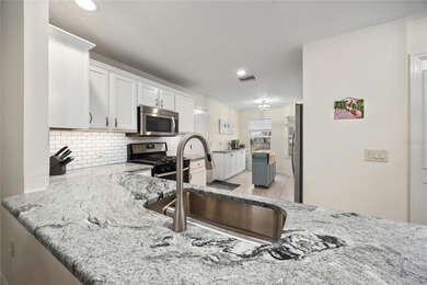 Beautifully maintained 3-bedroom, 2-bath home located in The on Nancy Lopez Legacy Golf and Country Club in Florida - for sale on GolfHomes.com, golf home, golf lot