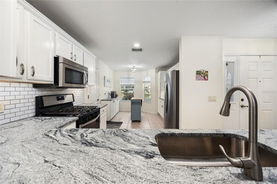 Beautifully maintained 3-bedroom, 2-bath home located in The on Nancy Lopez Legacy Golf and Country Club in Florida - for sale on GolfHomes.com, golf home, golf lot