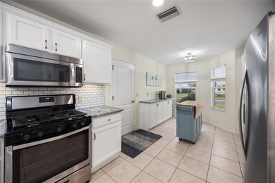 Beautifully maintained 3-bedroom, 2-bath home located in The on Nancy Lopez Legacy Golf and Country Club in Florida - for sale on GolfHomes.com, golf home, golf lot