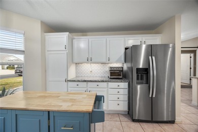 Beautifully maintained 3-bedroom, 2-bath home located in The on Nancy Lopez Legacy Golf and Country Club in Florida - for sale on GolfHomes.com, golf home, golf lot