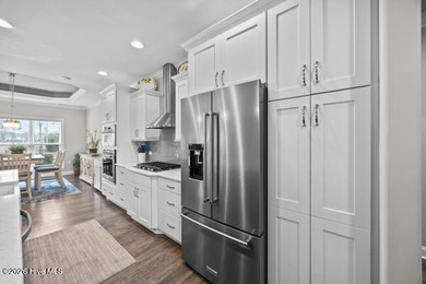 Perfectly positioned on a quiet cul-de-sac in sought-after on Compass Pointe Golf Course in North Carolina - for sale on GolfHomes.com, golf home, golf lot