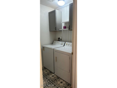 This is a second floor end unit with split bedrooms. Floors are on Copperhead Golf Club in Florida - for sale on GolfHomes.com, golf home, golf lot