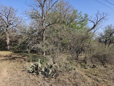 Wonderful hill country lot within minutes of Lake LBJ and on Packsaddle Country Club in Texas - for sale on GolfHomes.com, golf home, golf lot