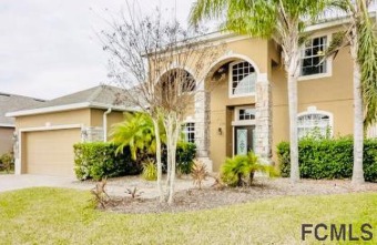 LUXURIOUS LAKEFRONT/ DESIGNER POOL HOME situated in one of the on LPGA International Golf Course in Florida - for sale on GolfHomes.com, golf home, golf lot