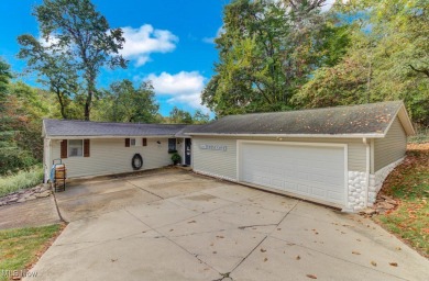 This cozy ranch at Lake Mohawk offers 3 bedrooms and 1.5 baths on Lake Mohawk Golf Club in Ohio - for sale on GolfHomes.com, golf home, golf lot