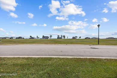 Beautiful pond front homesite in the gated community of Occano on Occano Golf Course in North Carolina - for sale on GolfHomes.com, golf home, golf lot