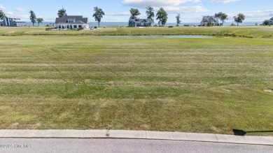 Beautiful pond front homesite in the gated community of Occano on Occano Golf Course in North Carolina - for sale on GolfHomes.com, golf home, golf lot