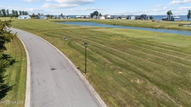 Beautiful pond front homesite in the gated community of Occano on Occano Golf Course in North Carolina - for sale on GolfHomes.com, golf home, golf lot