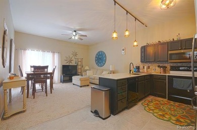 This lovely condo located directly across from White Lake Oaks on White Lake Oaks Golf Course in Michigan - for sale on GolfHomes.com, golf home, golf lot