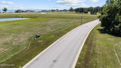 Beautiful pond front homesite in the gated community of Occano on Occano Golf Course in North Carolina - for sale on GolfHomes.com, golf home, golf lot