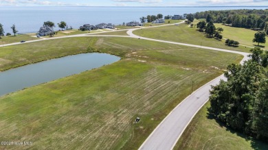 Beautiful pond front homesite in the gated community of Occano on Occano Golf Course in North Carolina - for sale on GolfHomes.com, golf home, golf lot