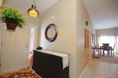 This lovely condo located directly across from White Lake Oaks on White Lake Oaks Golf Course in Michigan - for sale on GolfHomes.com, golf home, golf lot