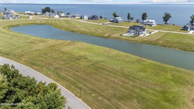 Beautiful pond front homesite in the gated community of Occano on Occano Golf Course in North Carolina - for sale on GolfHomes.com, golf home, golf lot
