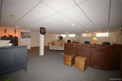 This lovely condo located directly across from White Lake Oaks on White Lake Oaks Golf Course in Michigan - for sale on GolfHomes.com, golf home, golf lot