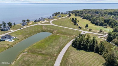 Beautiful pond front homesite in the gated community of Occano on Occano Golf Course in North Carolina - for sale on GolfHomes.com, golf home, golf lot