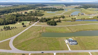Beautiful pond front homesite in the gated community of Occano on Occano Golf Course in North Carolina - for sale on GolfHomes.com, golf home, golf lot