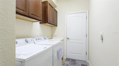 PRICED TO SELL. LOWEST PRICED 3 CAR GARAGE SINGLE FAMILY HOME IN on Plantation Golf and Country Club in Florida - for sale on GolfHomes.com, golf home, golf lot
