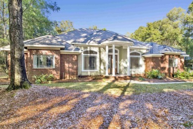 This beautiful home sits on a shaded lot (1.36 acre) in the on Rock Creek Golf Club in Alabama - for sale on GolfHomes.com, golf home, golf lot