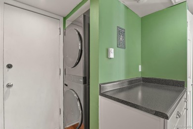 Beautifully updated townhome overlooking the 11th-hole fairway on Golf Club At Heather Ridge in Colorado - for sale on GolfHomes.com, golf home, golf lot