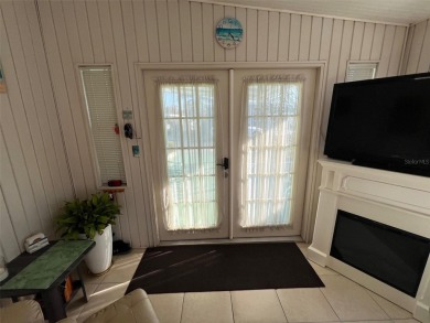 This stunning home, showcasing premium upgrades, is a on Palm Hill Golf Club in Florida - for sale on GolfHomes.com, golf home, golf lot